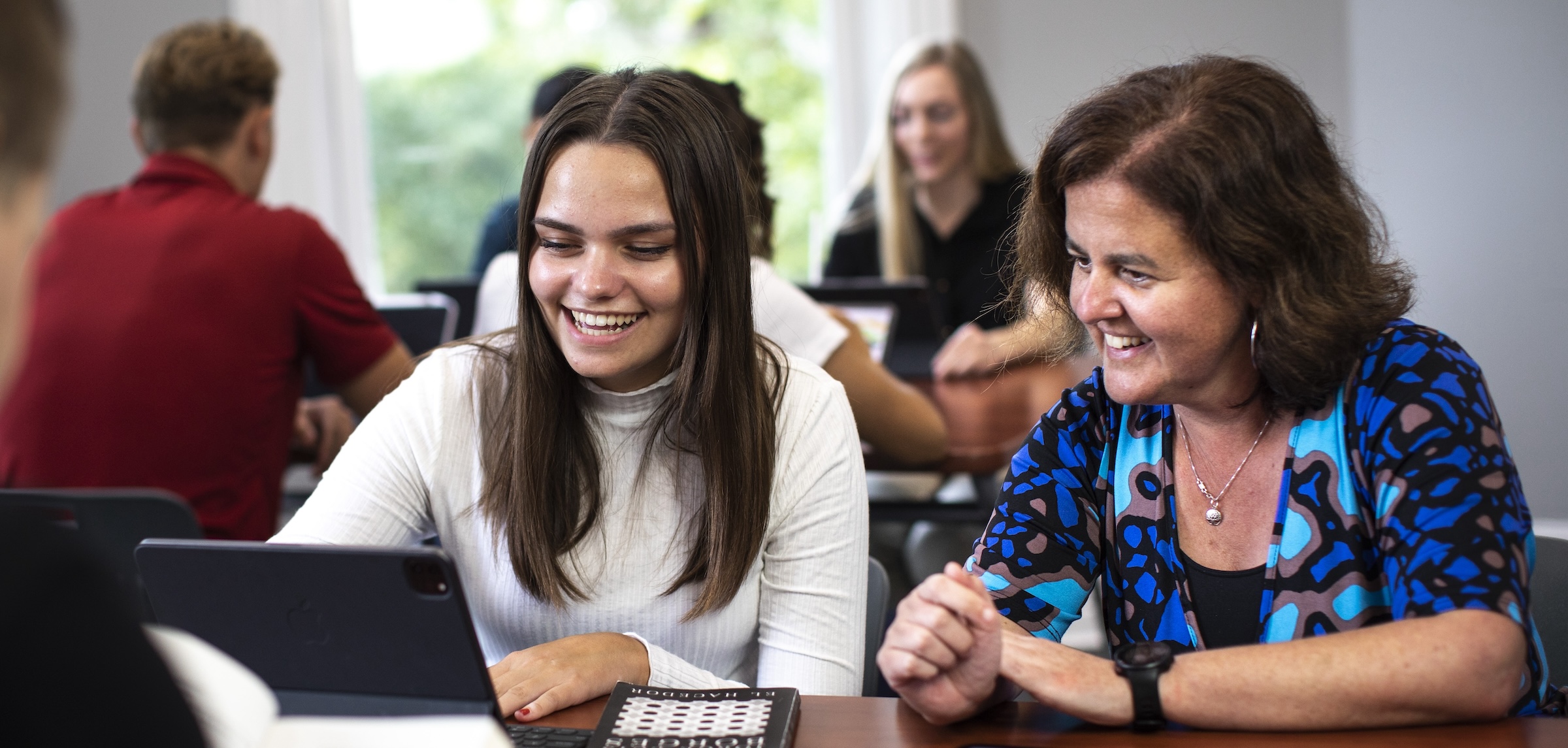 Professor helping student