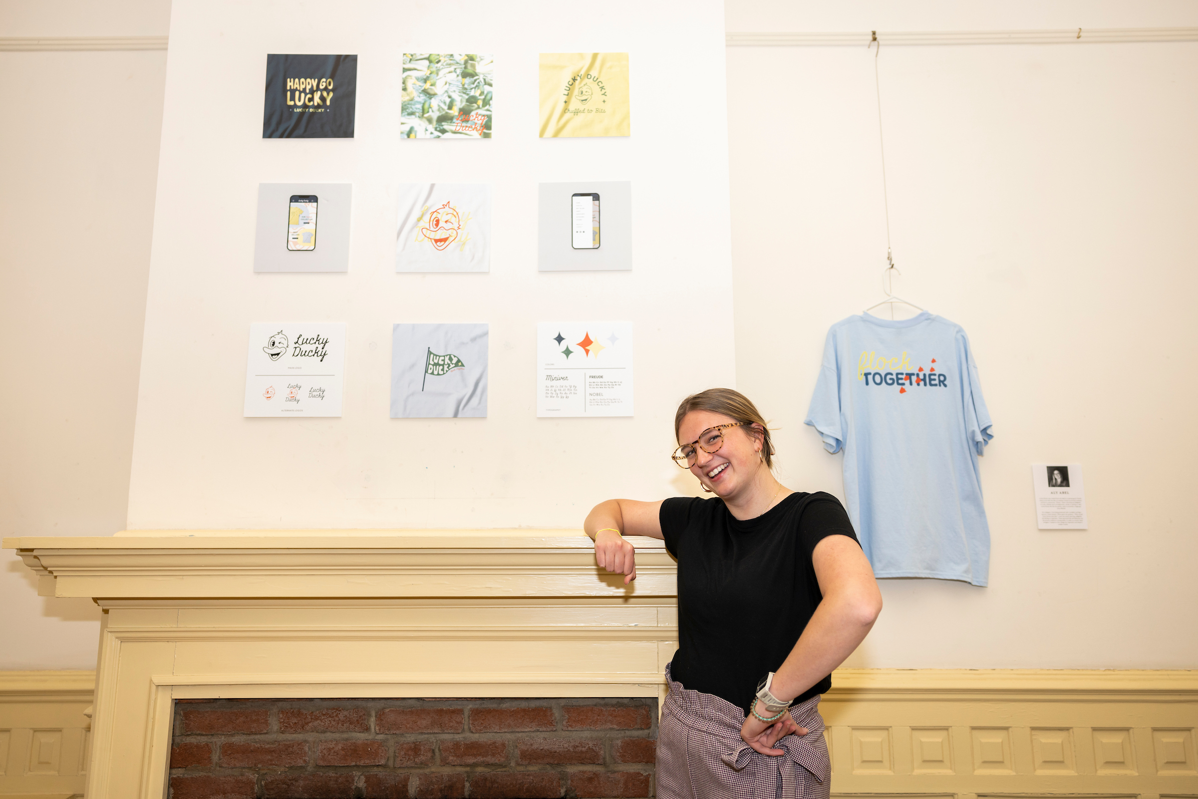 Aly Day with graphic design work.