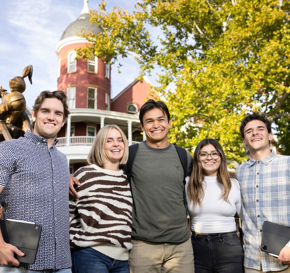five students in front of Main Hall