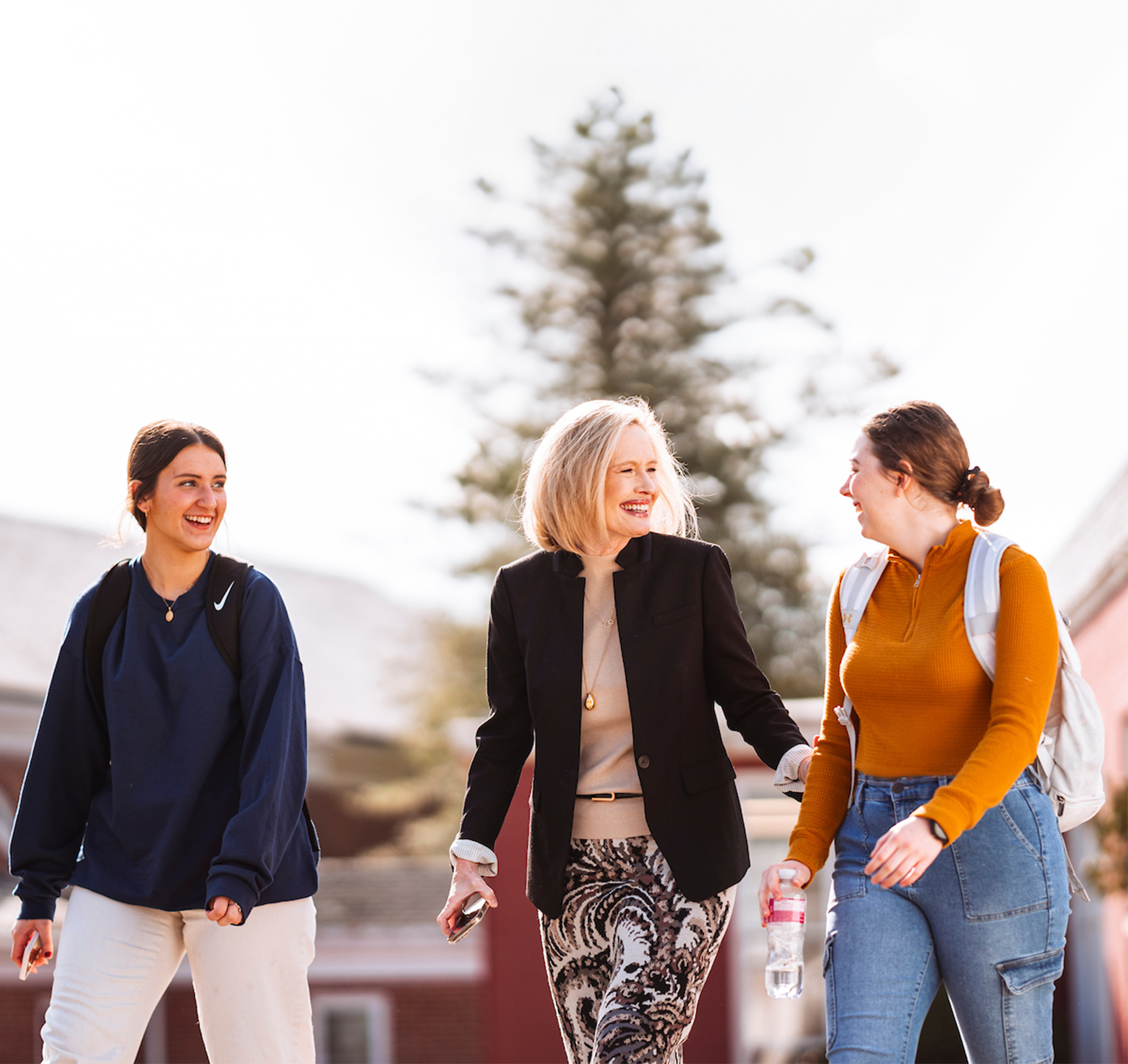 President Cordon walking with students