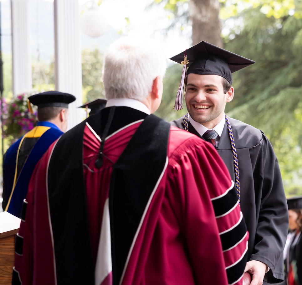Student receiving their diploma