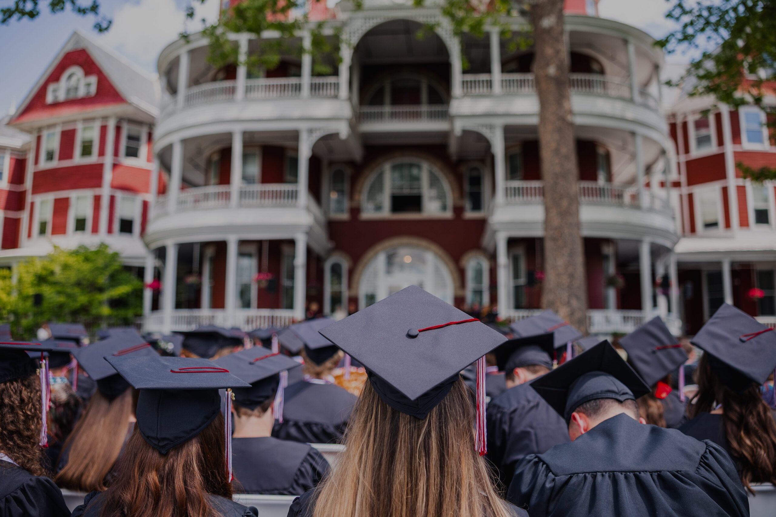 Graduates stand at their graduation ceremony for SVU