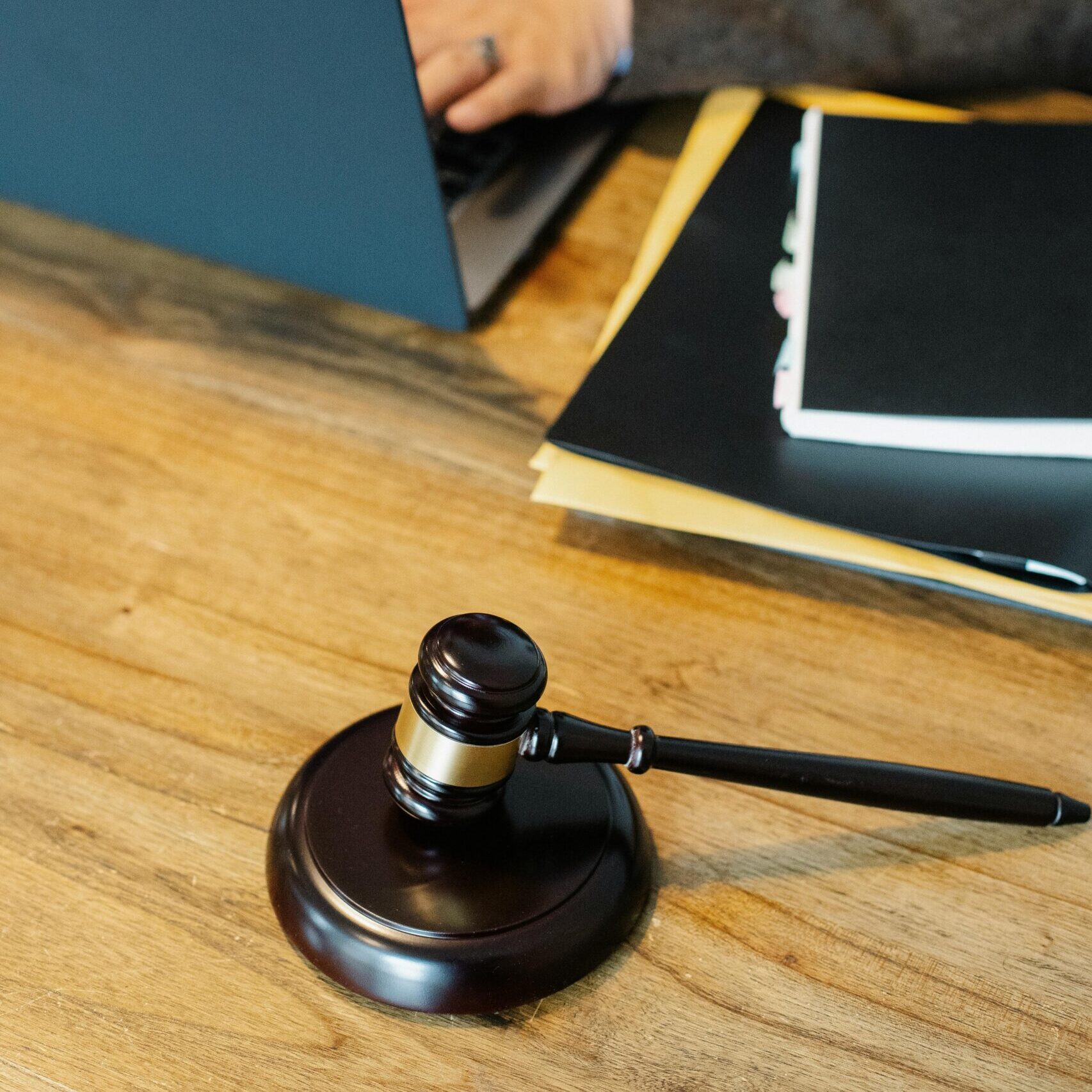 Wooden Gavel on Wooden Surface